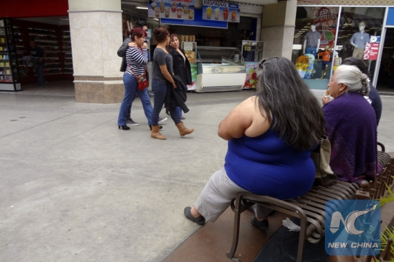 Image taken on May 6, 2015 shows an overweight woman in a mall in Tijuana City, northeast of Mexico. (Photo/Xinhua) Image taken on May 6, 2015 shows an overweight woman in a mall in Tijuana City, northeast of Mexico. (Photo/Xinhua)