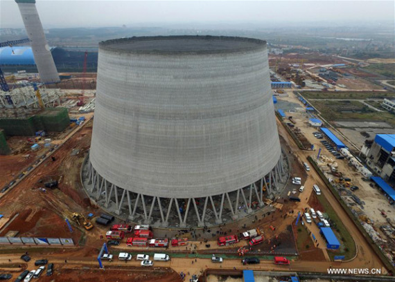 Aerial photo taken on Nov. 24, 2016 shows the accident site at the Fengcheng power plant in Yichun City, east China's Jiangxi Province. Sixty-seven people have been confirmed dead and another missing as a platform of a power plant's cooling tower under construction collapsed in Jiangxi Thursday, rescuers said. (Photo: Xinhua/Wan Xiang) Aerial photo taken on Nov. 24, 2016 shows the accident site at the Fengcheng power plant in Yichun City, east China's Jiangxi Province. Sixty-seven people have been confirmed dead and another missing as a platform of a power plant's cooling tower under construction collapsed in Jiangxi Thursday, rescuers said. (Photo: Xinhua/Wan Xiang)