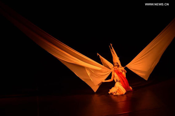 A dancer of the Beijing Modern Dance Company performs in Oath-Midnight Rain in Cairo, Egypt on Nov. 27, 2016. Egyptian audience has a great opportunity to closely experience the Chinese modern dance as a Beijing-based troupe performed on stage in Cairo Sunday. (Photo: Xinhua/Zhao Dingzhe) A dancer of the Beijing Modern Dance Company performs in Oath-Midnight Rain in Cairo, Egypt on Nov. 27, 2016. Egyptian audience has a great opportunity to closely experience the Chinese modern dance as a Beijing-based troupe performed on stage in Cairo Sunday. (Photo: Xinhua/Zhao Dingzhe)
