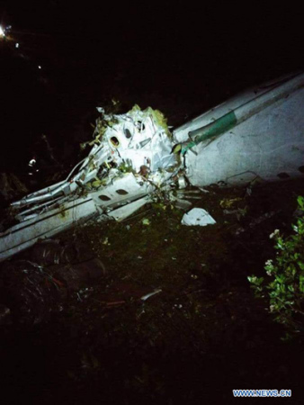 Photo taken on Nov. 28, 2016 provided by Noticias Telemedellin, shows the debris of the plane carrying the Brazilian football team Chapecoense, that crashed in a mountainous area outside the Colombian city of Medellin, in the department of Antioquia, Colombia. (Photo/Xinhua) Photo taken on Nov. 28, 2016 provided by Noticias Telemedellin, shows the debris of the plane carrying the Brazilian football team Chapecoense, that crashed in a mountainous area outside the Colombian city of Medellin, in the department of Antioquia, Colombia. (Photo/Xinhua)