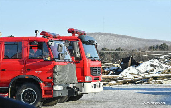 Photo taken on Dec. 2, 2016 shows fire engines at the accident site after a private coal mine blast in Qitaihe City, northeast China's Heilongjiang Province. Twenty-one people had been confirmed dead and one was still trapped in the explosion accident which occurred on Nov. 29. (Xinhua/Wang Song) Photo taken on Dec. 2, 2016 shows fire engines at the accident site after a private coal mine blast in Qitaihe City, northeast China's Heilongjiang Province. Twenty-one people had been confirmed dead and one was still trapped in the explosion accident which occurred on Nov. 29. (Xinhua/Wang Song)