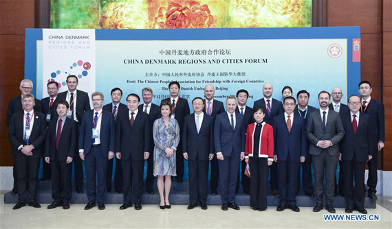 Chinese State Councilor Yang Jiechi (C, front) and Danish Minister of Gender Equality and Minister for Nordic Cooperation Karen Ellemann (5th L, front) pose for a group photo at the opening ceremony of the China Denmark Regions and Cities Forum held by the Chinese People's Association for Friendship with Foreign Countries and the Danish embassy in Beijing, capital of China, Dec. 5, 2016. (Photo: Xinhua/Zhang Ling) Chinese State Councilor Yang Jiechi (C, front) and Danish Minister of Gender Equality and Minister for Nordic Cooperation Karen Ellemann (5th L, front) pose for a group photo at the opening ceremony of the China Denmark Regions and Cities Forum held by the Chinese People's Association for Friendship with Foreign Countries and the Danish embassy in Beijing, capital of China, Dec. 5, 2016. (Photo: Xinhua/Zhang Ling)