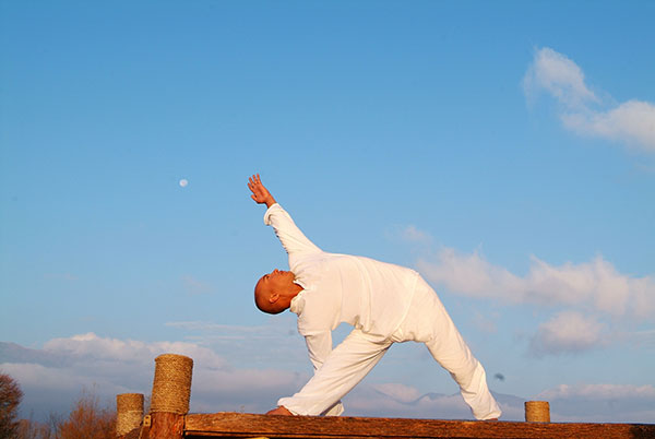 Yoga is practiced by young and old alike throughout the world, UNESCO noted. (Photo by Zhu Xingxin/China Daily)