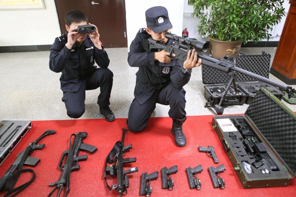 SWAT team officers of Shenyang police exhibit their advanced weaponry and equipment in Liaoning province last month.Zhao Jingdong / For China Daily SWAT team officers of Shenyang police exhibit their advanced weaponry and equipment in Liaoning province last month.Zhao Jingdong / For China Daily