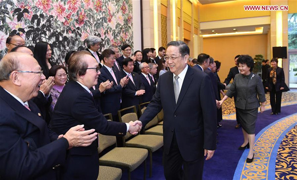 Yu Zhengsheng, chairman of the National Committee of the Chinese People's Political Consultative Conference, meets with a visiting delegation from the Hong Kong Chiu Chow Chamber of Commerce at the Diaoyutai State Guesthouse in Beijing, capital of China, Dec. 13, 2016. (Xinhua/Zhang Duo) Yu Zhengsheng, chairman of the National Committee of the Chinese People's Political Consultative Conference, meets with a visiting delegation from the Hong Kong Chiu Chow Chamber of Commerce at the Diaoyutai State Guesthouse in Beijing, capital of China, Dec. 13, 2016. (Xinhua/Zhang Duo)