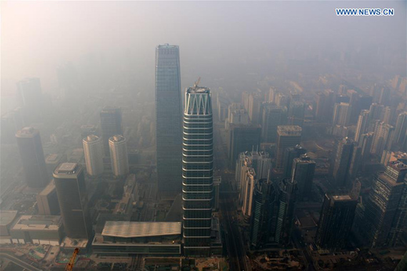 Photo taken on Dec. 17, 2016 shows buildings enveloped in smog in Beijing, capital of China.(Photo: Xinhua/Jin Liangkuai) Photo taken on Dec. 17, 2016 shows buildings enveloped in smog in Beijing, capital of China.(Photo: Xinhua/Jin Liangkuai)