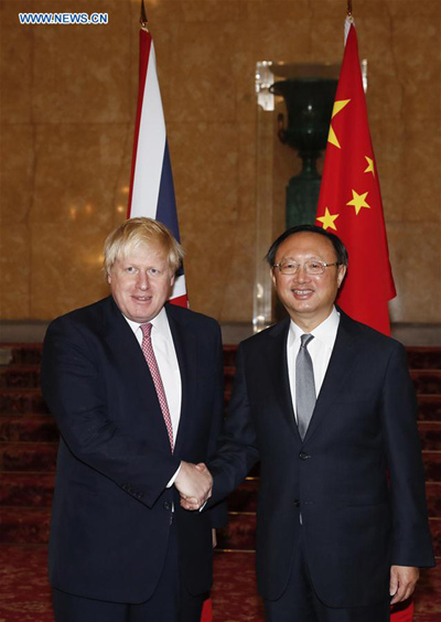 Visiting Chinese State Councilor Yang Jiechi (R) shakes hands with British Foreign Secretary Boris Johnson before the eighth China-UK Strategic Dialogue in London, Britain, on Dec. 20, 2016. (Photo: Xinhua/Han Yan) Visiting Chinese State Councilor Yang Jiechi (R) shakes hands with British Foreign Secretary Boris Johnson before the eighth China-UK Strategic Dialogue in London, Britain, on Dec. 20, 2016. (Photo: Xinhua/Han Yan)