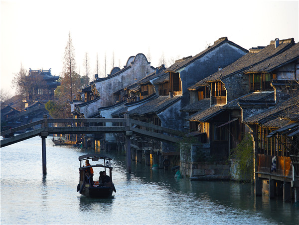 The ancient water town provides a unique backdrop for the futurist show. (Photo provided to China Daily) The ancient water town provides a unique backdrop for the futurist show. (Photo provided to China Daily)