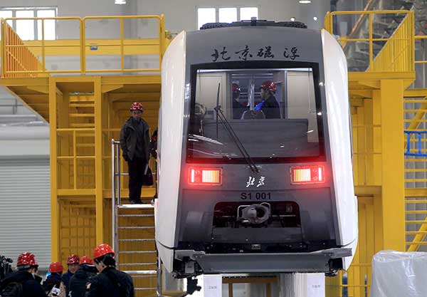 A maglev train for Beijing's new S1 line on Sunday. The maglev line is expected to start operation by the end of next year. Cheng Gong / For China Daily A maglev train for Beijing's new S1 line on Sunday. The maglev line is expected to start operation by the end of next year. Cheng Gong / For China Daily