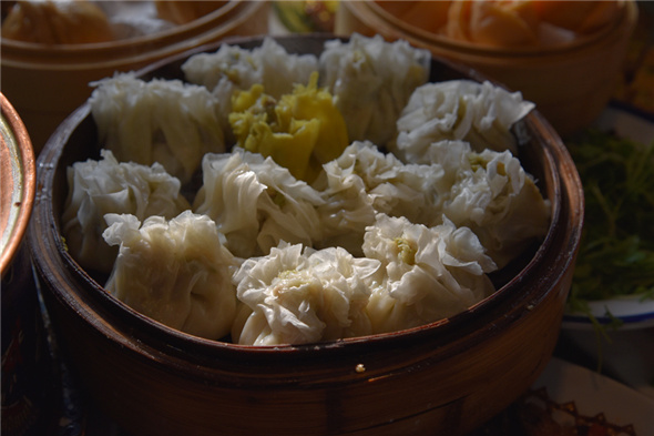 Manchu-style steamed dumplings (Photo by Zhang Xingjian/chinadaily.com.cn) Manchu-style steamed dumplings (Photo by Zhang Xingjian/chinadaily.com.cn)