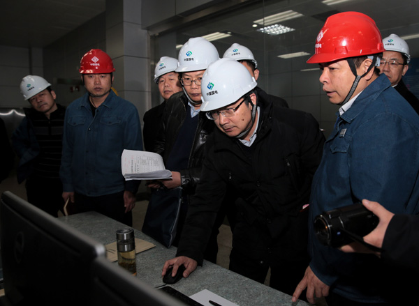 Environmental inspectors dispatched by the central government examine a polluting power plant in Heze, Shandong province, in December.Cai Yang/ Xinhua Environmental inspectors dispatched by the central government examine a polluting power plant in Heze, Shandong province, in December.Cai Yang/ Xinhua