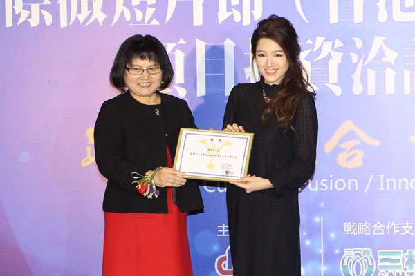 Christine Kuo Wan-wai (right), a Hong Kong actress and winner of the Miss Chinese International Pageant 2009, was designated on Monday as the ambassador of the Cannes Micro-Film Festival by Tong Aiming (left), president of the French-Chinese Cultural and Artistic Exchange Center. (Photo provided to China Daily) Christine Kuo Wan-wai (right), a Hong Kong actress and winner of the Miss Chinese International Pageant 2009, was designated on Monday as the ambassador of the Cannes Micro-Film Festival by Tong Aiming (left), president of the French-Chinese Cultural and Artistic Exchange Center. (Photo provided to China Daily)