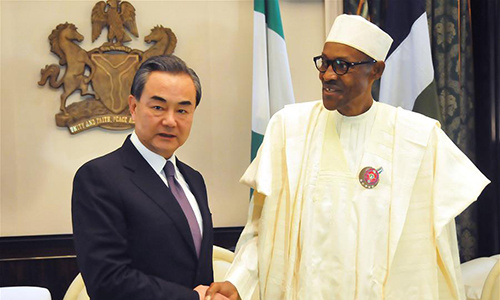 Nigerian President Muhammadu Buhari (R) meets with Chinese Foreign Minister Wang Yi in Abuja, Nigeria, on Jan. 11, 2017. The Nigerian government reaffirmed its commitment to One-China policy on Wednesday, saying Nigeria will stay committed to the long-standing friendship and cooperation with China. (Xinhua/Zhang Baoping) Nigerian President Muhammadu Buhari (R) meets with Chinese Foreign Minister Wang Yi in Abuja, Nigeria, on Jan. 11, 2017. The Nigerian government reaffirmed its commitment to One-China policy on Wednesday, saying Nigeria will stay committed to the long-standing friendship and cooperation with China. (Xinhua/Zhang Baoping)