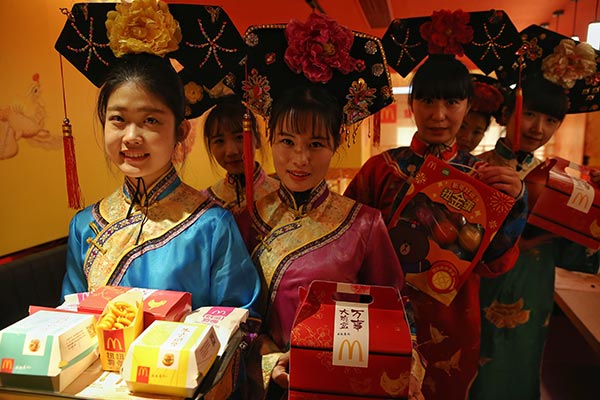 The McDonald's holds an event to promote its New Year menu. (Photo by Jiang Dong/China Daily) The McDonald's holds an event to promote its New Year menu. (Photo by Jiang Dong/China Daily)