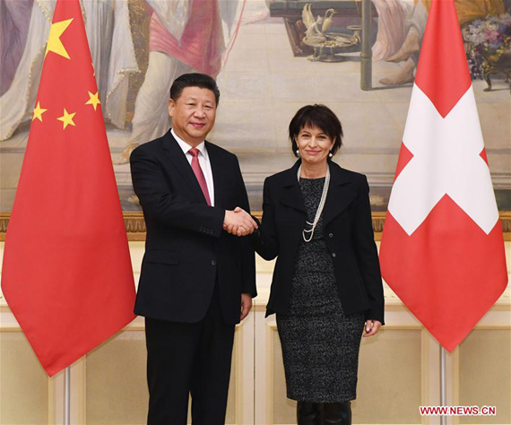 Chinese President Xi Jinping (L) shakes hands with his Swiss counterpart Doris Leuthard in Bern, Switzerland, Jan. 16, 2017. (Xinhua/Rao Aimin) Chinese President Xi Jinping (L) shakes hands with his Swiss counterpart Doris Leuthard in Bern, Switzerland, Jan. 16, 2017. (Xinhua/Rao Aimin)