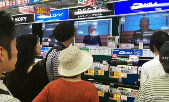 People watch Japanese Emperor Akihito delivering a video message at a store in Tokyo, Japan, on Aug. 8, 2016. (Xinhua/Hua Yi) People watch Japanese Emperor Akihito delivering a video message at a store in Tokyo, Japan, on Aug. 8, 2016. (Xinhua/Hua Yi)