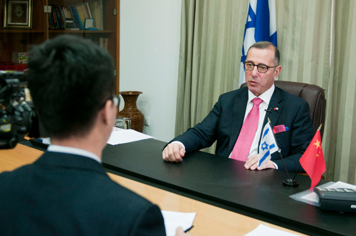 Zvi Heifetz (R), Israeli Ambassador to China, gives an exclusive interview to Xinhuanet in Beijing, capital of China, on Jan. 23, 2017. (Xinhuanet/He Xianfeng)
