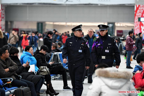 Police officers Gao Yang (C-L) and Nie Yingjie (C-R) patrol at the Changchun Railway Station during Spring Festial travel rush in northeast China's Jilin Province, Jan. 26, 2017. (Xinhua/Zhang Nan) Police officers Gao Yang (C-L) and Nie Yingjie (C-R) patrol at the Changchun Railway Station during Spring Festial travel rush in northeast China's Jilin Province, Jan. 26, 2017. (Xinhua/Zhang Nan)