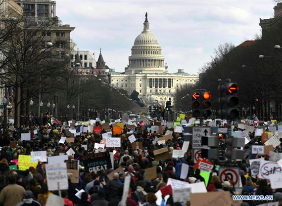 Demonstrators participating in a protest against U.S. President Donald Trump's executive order temporarily barring all refugees and seven Mideast and North African countries' citizens from entry into the U.S. march towards Capitol Hill in Washington D.C., the Unite States, on Jan. 29, 2017. (Photo/Xinhua) Demonstrators participating in a protest against U.S. President Donald Trump's executive order temporarily barring all refugees and seven Mideast and North African countries' citizens from entry into the U.S. march towards Capitol Hill in Washington D.C., the Unite States, on Jan. 29, 2017. (Photo/Xinhua)