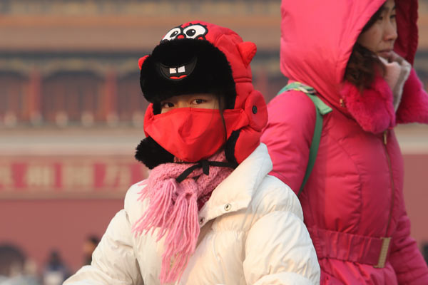 A girl wears a mask in Beijing. (Photo provided to China Daily) A girl wears a mask in Beijing. (Photo provided to China Daily)