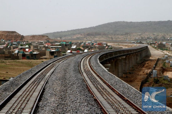 Photo taken on May 18, 2015 shows the Addis Ababa/Sebeta-DireDawa, Djibouti Railway project during the track laying completion ceremony of the project in Addis Ababa, capital of Ethiopia.(Xinhua/Michael Tewelde) Photo taken on May 18, 2015 shows the Addis Ababa/Sebeta-DireDawa, Djibouti Railway project during the track laying completion ceremony of the project in Addis Ababa, capital of Ethiopia.(Xinhua/Michael Tewelde)