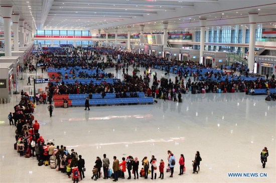 Passengers wait to board trains at Guiyang Railway Station in Guiyang, capital of southwest China's Guizhou Province, Feb. 3, 2017. China's railways braced for post-holiday travel rush, with travelers returning to work after the week-long Lunar New Year celebration. (Xinhua/Liu Xu) Passengers wait to board trains at Guiyang Railway Station in Guiyang, capital of southwest China's Guizhou Province, Feb. 3, 2017. China's railways braced for post-holiday travel rush, with travelers returning to work after the week-long Lunar New Year celebration. (Xinhua/Liu Xu)