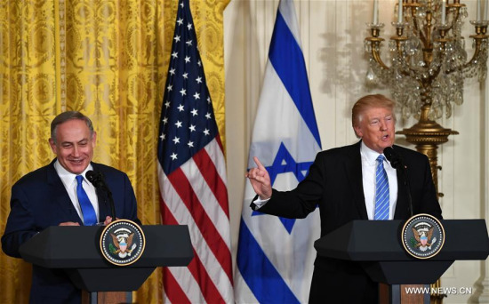 U.S. President Donald Trump (R) gestures at a joint press conference with visiting Israeli Prime Minister Benjamin Netanyahu at the White House in Washington D.C., the United States, on Feb. 15, 2017. (Xinhua/Yin Bogu) U.S. President Donald Trump (R) gestures at a joint press conference with visiting Israeli Prime Minister Benjamin Netanyahu at the White House in Washington D.C., the United States, on Feb. 15, 2017. (Xinhua/Yin Bogu)