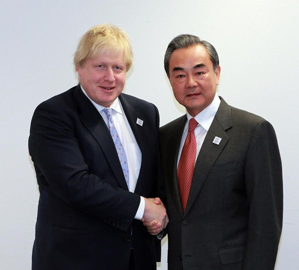 Foreign Minister Wang Yi (right) meets with his British counterpart Boris Johnson on the sidelines of the Group of Twenty (G20) foreign ministerial meeting in Bonn, Germany, Feb 17, 2017. (Photo/Xinhua) Foreign Minister Wang Yi (right) meets with his British counterpart Boris Johnson on the sidelines of the Group of Twenty (G20) foreign ministerial meeting in Bonn, Germany, Feb 17, 2017. (Photo/Xinhua)
