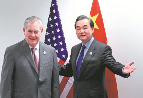 Foreign Minister Wang Yi and US Secretary of State Rex Tillerson meet on the sidelines of a gathering of foreign ministers of the G20 leading and developing economies at the World Conference Center in Bonn, Germany, on Friday. (Photo/China News Service) Foreign Minister Wang Yi and US Secretary of State Rex Tillerson meet on the sidelines of a gathering of foreign ministers of the G20 leading and developing economies at the World Conference Center in Bonn, Germany, on Friday. (Photo/China News Service)
