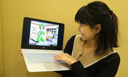 A Chinese player plays Stardom 2, a computer game produced by Taiwan-based company Softstar in 2000. (Photo: Li Hao/GT) A Chinese player plays Stardom 2, a computer game produced by Taiwan-based company Softstar in 2000. (Photo: Li Hao/GT)