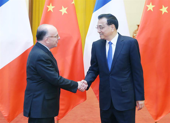 Chinese Premier Li Keqiang (R) shakes hands with French Prime Minister Bernard Cazeneuve in Beijing, capital of China, Feb. 21, 2017. (Xinhua/Yao Dawei) Chinese Premier Li Keqiang (R) shakes hands with French Prime Minister Bernard Cazeneuve in Beijing, capital of China, Feb. 21, 2017. (Xinhua/Yao Dawei)