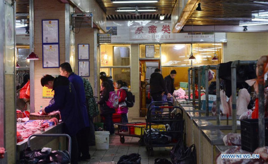 Photo taken on Feb. 22, 2017 shows a closed booth engaging in live poultry trading at a market in Nanchang, capital of east China's Jiangxi Province. Photo taken on Feb. 22, 2017 shows a closed booth engaging in live poultry trading at a market in Nanchang, capital of east China's Jiangxi Province.