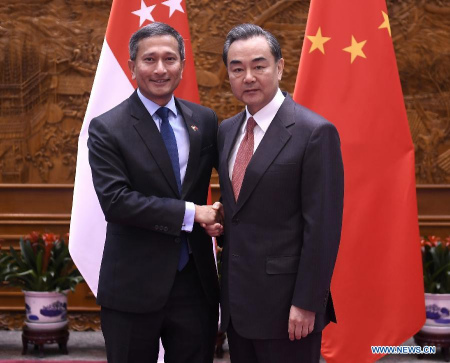 Chinese Foreign Minister Wang Yi (R) meets with Singapore's Minister for Foreign Affairs Vivian Balakrishnan in Beijing, capital of China, Feb. 27, 2017. (Xinhua/Yan Yan) Chinese Foreign Minister Wang Yi (R) meets with Singapore's Minister for Foreign Affairs Vivian Balakrishnan in Beijing, capital of China, Feb. 27, 2017. (Xinhua/Yan Yan)