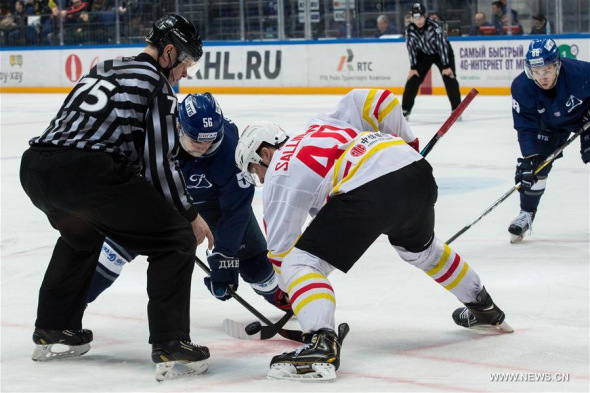 Tomi Sallinen (front R) of Kunlun Red Star of China vies with Ivan Igumnov (front C) of Dynamo Moscow of Russia on the face-off during the Kontinental Hockey League (KHL) game in Moscow, Russia, on Feb. 18, 2017. Dynamo Moscow won 2-1. (Xinhua/Evgeny Sinitsyn) Tomi Sallinen (front R) of Kunlun Red Star of China vies with Ivan Igumnov (front C) of Dynamo Moscow of Russia on the face-off during the Kontinental Hockey League (KHL) game in Moscow, Russia, on Feb. 18, 2017. Dynamo Moscow won 2-1. (Xinhua/Evgeny Sinitsyn)