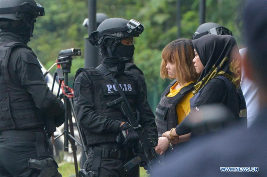 Vietnamese national Doan Thi Huong (2nd R, in yellow) leaves the Sepang court as she is escorted with Malaysia special armed forces in Sepang, Malaysia, on March 1, 2017. (Xinhua/Chong Voon Chung) Vietnamese national Doan Thi Huong (2nd R, in yellow) leaves the Sepang court as she is escorted with Malaysia special armed forces in Sepang, Malaysia, on March 1, 2017. (Xinhua/Chong Voon Chung)