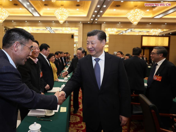 Chinese President Xi Jinping joins a panel discussion with political advisors from the China Association for Promoting Democracy, the Chinese Peasants and Workers Democratic Party and the Jiu San Society at the fifth session of the 12th National Committee of the Chinese People's Political Consultative Conference (CPPCC) in Beijing, capital of China, March 4, 2017.  (Xinhua/Ju Peng)