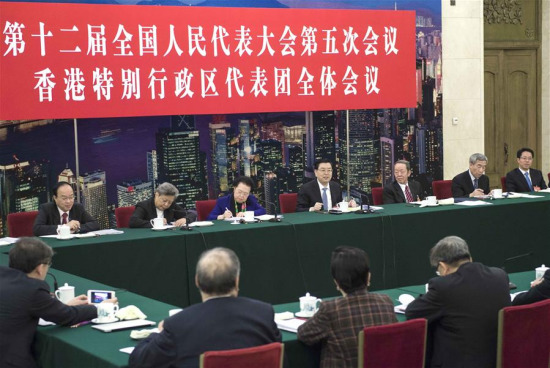 Zhang Dejiang, chairman of the Standing Committee of China's National People's Congress (NPC), joins a panel discussion with deputies to the 12th NPC from Hong Kong Special Administrative Region at the annual session of the NPC in Beijing, capital of China, March 6, 2017. (Xinhua/Li Tao) Zhang Dejiang, chairman of the Standing Committee of China's National People's Congress (NPC), joins a panel discussion with deputies to the 12th NPC from Hong Kong Special Administrative Region at the annual session of the NPC in Beijing, capital of China, March 6, 2017. (Xinhua/Li Tao)