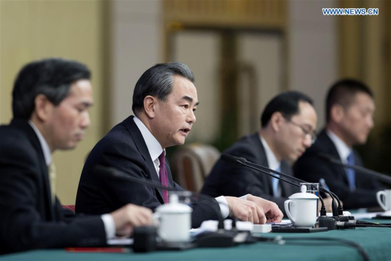 Chinese Foreign Minister Wang Yi (2nd L) takes questions on China's foreign policy and foreign relations at a press conference for the fifth session of the 12th National People's Congress in Beijing, capital of China, March 8, 2017. (Xinhua/Cui Xinyu) Chinese Foreign Minister Wang Yi (2nd L) takes questions on China's foreign policy and foreign relations at a press conference for the fifth session of the 12th National People's Congress in Beijing, capital of China, March 8, 2017. (Xinhua/Cui Xinyu)