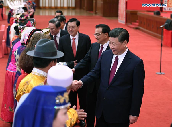 Top Communist Party of China and state leaders Xi Jinping, Li Keqiang, Zhang Dejiang, Yu Zhengsheng, Liu Yunshan, Wang Qishan and Zhang Gaoli attend a gathering with ethnic minority deputies to the 12th National People's Congress (NPC) and ethnic minority members of the 12th National Committee of the Chinese People's Political Consultative Conference (CPPCC) on the sidelines of the ongoing annual sessions of the NPC and the CPPCC National Committee at the Great Hall of the People in Beijing, capital of China, March 11, 2017. (Xinhua/Li Xueren) Top Communist Party of China and state leaders Xi Jinping, Li Keqiang, Zhang Dejiang, Yu Zhengsheng, Liu Yunshan, Wang Qishan and Zhang Gaoli attend a gathering with ethnic minority deputies to the 12th National People's Congress (NPC) and ethnic minority members of the 12th National Committee of the Chinese People's Political Consultative Conference (CPPCC) on the sidelines of the ongoing annual sessions of the NPC and the CPPCC National Committee at the Great Hall of the People in Beijing, capital of China, March 11, 2017. (Xinhua/Li Xueren)