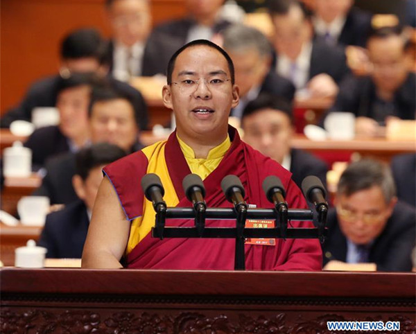 The 11th Panchen Lama Bainqen Erdini Qoigyijabu, a member of the 12th National Committee of the Chinese People's Political Consultative Conference (CPPCC), delivers a speech at the fourth plenary meeting of the fifth session of the 12th CPPCC National Committee in the Great Hall of the People in Beijing, capital of China, March 11, 2017. (Xinhua/Yao Dawei) The 11th Panchen Lama Bainqen Erdini Qoigyijabu, a member of the 12th National Committee of the Chinese People's Political Consultative Conference (CPPCC), delivers a speech at the fourth plenary meeting of the fifth session of the 12th CPPCC National Committee in the Great Hall of the People in Beijing, capital of China, March 11, 2017. (Xinhua/Yao Dawei)