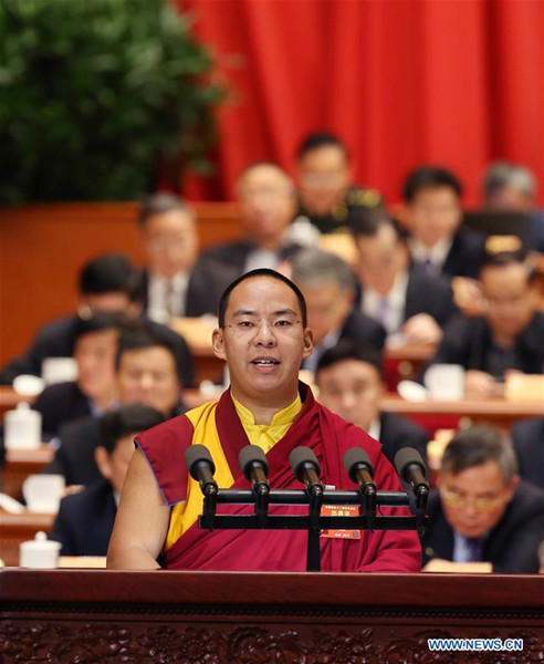 The 11th Panchen Lama Bainqen Erdini Qoigyijabu, a member of the 12th National Committee of the Chinese People's Political Consultative Conference (CPPCC), delivers a speech at the fourth plenary meeting of the fifth session of the 12th CPPCC National Committee in the Great Hall of the People in Beijing, capital of China, March 11, 2017. (Xinhua/Yao Dawei) The 11th Panchen Lama Bainqen Erdini Qoigyijabu, a member of the 12th National Committee of the Chinese People's Political Consultative Conference (CPPCC), delivers a speech at the fourth plenary meeting of the fifth session of the 12th CPPCC National Committee in the Great Hall of the People in Beijing, capital of China, March 11, 2017. (Xinhua/Yao Dawei)