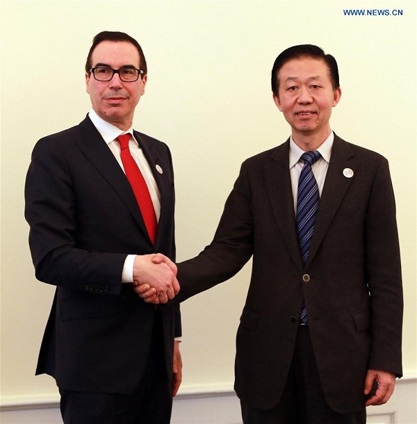 Chinese Finance Minister Xiao Jie (R) meets with U.S. Treasury Secretary Steven Mnuchin in Baden-Baden, Germany, March 18, 2017. Chinese Finance Minister Xiao Jie on Saturday met with U.S. Treasury Secretary Steven Mnuchin on the sidelines of the G20 Finance Ministers and Central Bank Governors Meeting in Germany's southwestern city of Baden-Baden. The two sides have called for enhancing the economic cooperation between the two countries. (Xinhua/Luo Huanhuan) Chinese Finance Minister Xiao Jie (R) meets with U.S. Treasury Secretary Steven Mnuchin in Baden-Baden, Germany, March 18, 2017. Chinese Finance Minister Xiao Jie on Saturday met with U.S. Treasury Secretary Steven Mnuchin on the sidelines of the G20 Finance Ministers and Central Bank Governors Meeting in Germany's southwestern city of Baden-Baden. The two sides have called for enhancing the economic cooperation between the two countries. (Xinhua/Luo Huanhuan)