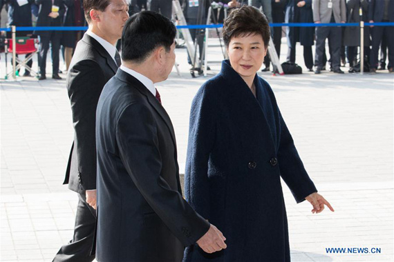 Ousted South Korean President Park Geun-hye (R) arrives at the prosecutors' office in Seoul, South Korea, March 21, 2017. Park Geun-hye appeared Tuesday in the prosecutors' office to be questioned over an corruption scandal that led to her impeachment earlier this month. (Xinhua/Lee Sang-ho) Ousted South Korean President Park Geun-hye (R) arrives at the prosecutors' office in Seoul, South Korea, March 21, 2017. Park Geun-hye appeared Tuesday in the prosecutors' office to be questioned over an corruption scandal that led to her impeachment earlier this month. (Xinhua/Lee Sang-ho)