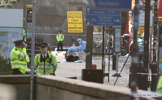 Emergency services staff and forensic officers work on Westminster Bridge in London, Britain on March 22, 2017. (Xinhua/Tim Ireland) Emergency services staff and forensic officers work on Westminster Bridge in London, Britain on March 22, 2017. (Xinhua/Tim Ireland)