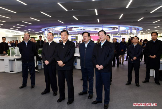 Liu Yunshan (C, front), a member of the Standing Committee of the Political Bureau of the Communist Party of China (CPC) Central Committee, views new media products at the People's Daily in Beijing, capital of China, March 22, 2017. (Xinhua/Rao Aimin) Liu Yunshan (C, front), a member of the Standing Committee of the Political Bureau of the Communist Party of China (CPC) Central Committee, views new media products at the People's Daily in Beijing, capital of China, March 22, 2017. (Xinhua/Rao Aimin)