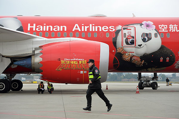 A plane of Hainan Airlines lands at Shuangliu airport in Chengdu, Sichuan province. (Photo/China Daily) A plane of Hainan Airlines lands at Shuangliu airport in Chengdu, Sichuan province. (Photo/China Daily)
