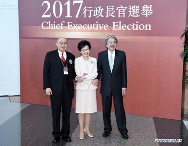 Candidates Tsang Chun-wah, Lam Cheng Yuet-ngor and Woo Kwok-hing (from R to L) pose for a photo in Hong Kong, south China, March 26, 2017. The voting for the fifth-term chief executive of China's Hong Kong Special Administrative Region (SAR) started on Sunday. (Xinhua/Wang Xi) Candidates Tsang Chun-wah, Lam Cheng Yuet-ngor and Woo Kwok-hing (from R to L) pose for a photo in Hong Kong, south China, March 26, 2017. The voting for the fifth-term chief executive of China's Hong Kong Special Administrative Region (SAR) started on Sunday. (Xinhua/Wang Xi)