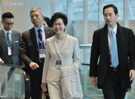 Lam Cheng Yuet-ngor (2nd R) arrives at the Hong Kong Convention and Exhibition Center before the voting for the fifth-term chief executive of China's Hong Kong Special Administrative Region (SAR), March 26, 2017. Lam Cheng Yuet-ngor wins the election of Hong Kong's fifth-term chief executive by obtaining more than 600 votes. (Xinhua/Wang Xi) Lam Cheng Yuet-ngor (2nd R) arrives at the Hong Kong Convention and Exhibition Center before the voting for the fifth-term chief executive of China's Hong Kong Special Administrative Region (SAR), March 26, 2017. Lam Cheng Yuet-ngor wins the election of Hong Kong's fifth-term chief executive by obtaining more than 600 votes. (Xinhua/Wang Xi)