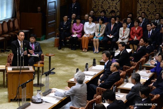 Yasunori Kagoike (L), president of Moritomo Gakuen school, answers questions during a session of the House of Councillors Budget Committee in Tokyo, March 23, 2017. (Xinhua/Ma Ping) Yasunori Kagoike (L), president of Moritomo Gakuen school, answers questions during a session of the House of Councillors Budget Committee in Tokyo, March 23, 2017. (Xinhua/Ma Ping)