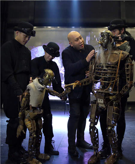 Ma Liang (second from right) instructs performers at a rehearsal in Beijing. (Photo by Zou Hong/China Daily) Ma Liang (second from right) instructs performers at a rehearsal in Beijing. (Photo by Zou Hong/China Daily)